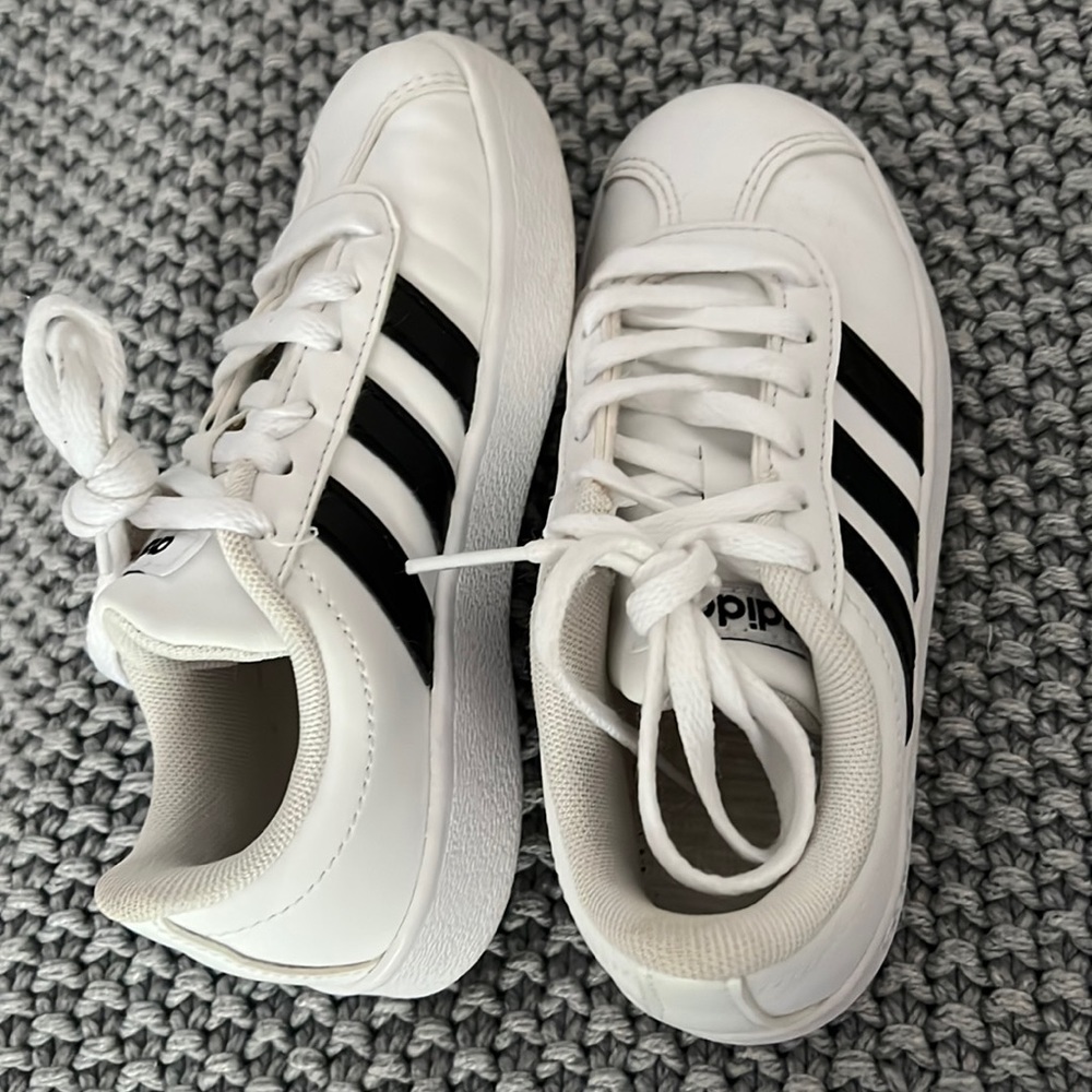 Adidas white shoes with black stripes size 10.5 (US) for boys